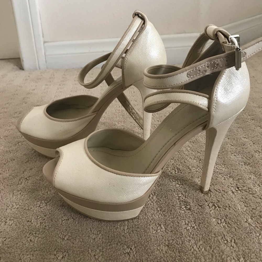 Used cream color 5” BCBG heels